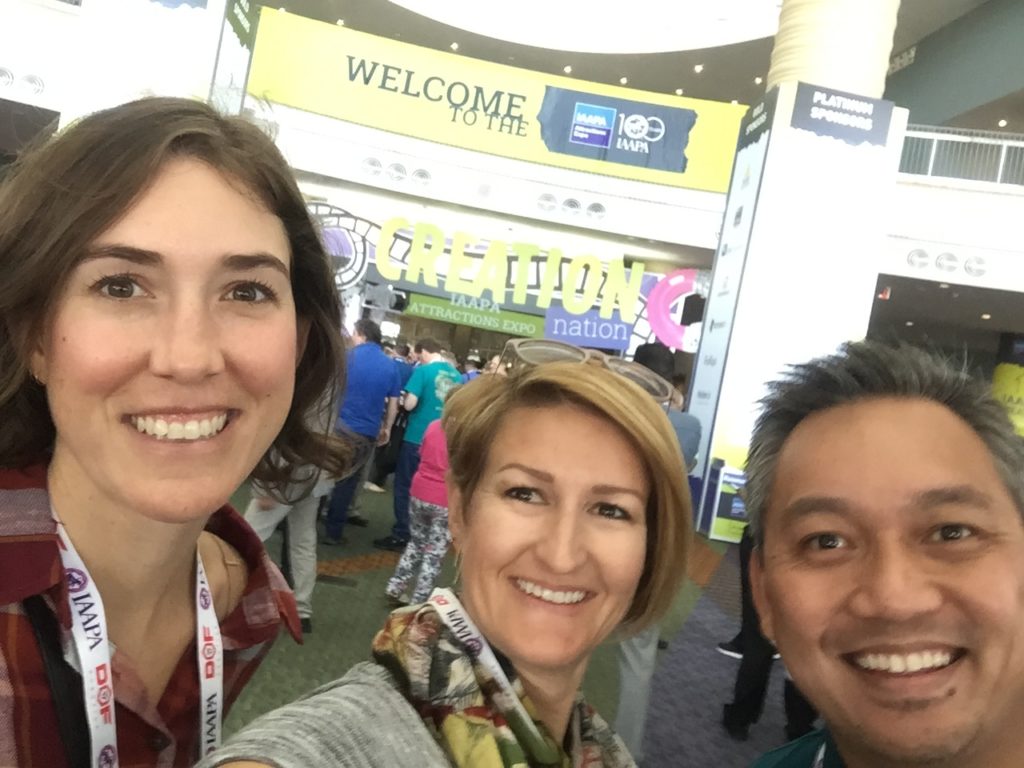perfect game marketing team smiling at iaapa 2017